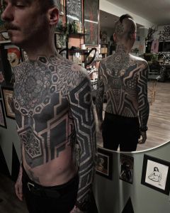 Backpiece tattoos by Manuel Zellkern