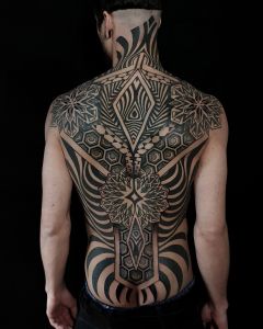Backpiece tattoos by Manuel Zellkern