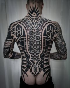 Backpiece tattoos by Manuel Zellkern