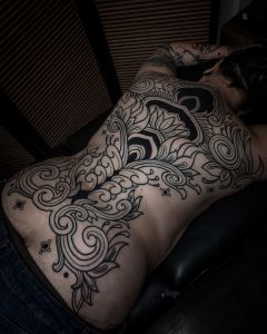 Backpiece tattoos by Manuel Zellkern