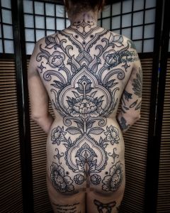Backpiece tattoos by Manuel Zellkern