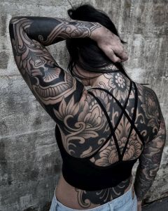 Backpiece tattoos by Manuel Zellkern