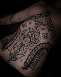 Chest piece tattoos by Manuel Zellkern