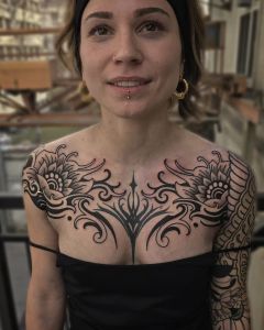 Chest piece tattoos by Manuel Zellkern