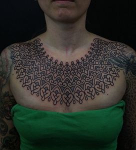 Chest piece tattoos by Manuel Zellkern