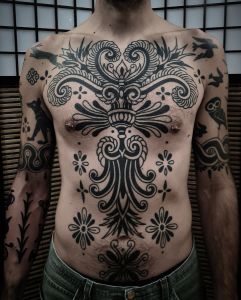 Chest piece tattoos by Manuel Zellkern