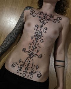 Chest piece tattoos by Manuel Zellkern