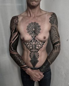 Chest piece tattoos by Manuel Zellkern