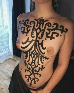 Chest piece tattoos by Manuel Zellkern