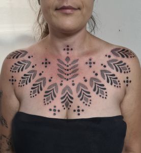 Chest piece tattoos by Manuel Zellkern