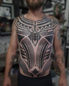 Chest piece tattoos by Manuel Zellkern