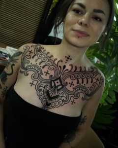 Chest piece tattoos by Manuel Zellkern