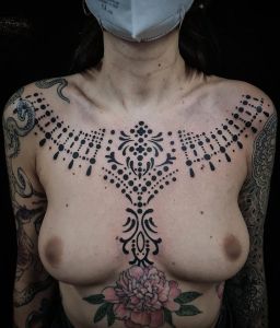 Chest piece tattoos by Manuel Zellkern