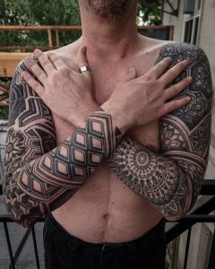 Sleeve tattoos by Manuel Zellkern